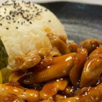 Chicken Teriyaki Don · Chicken tight marinated with teriyaki sauce over rice, top with green onion and sesame