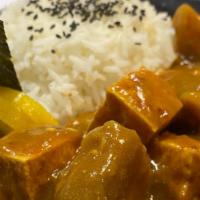 Fried Tofu Curry Don · Japanese curry with fried tofu, takuan, nori with top of Nori seaoning  ,sesame and white rice