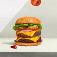 Smash Double Cheeseburger · Two premium ground angus chuck smashed patties, American cheese and our dirty sauce on a Mar...