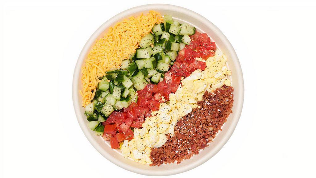 Chop Salad · Romaine, cucumber, tomato, egg, bacon, cheddar, blue cheese vinaigrette