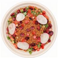 Kale And Quinoa Salad · kale, sliced radish, red pepper, sunflower seeds, cucumbers, tomatoes, ginger vinaigrette, f...