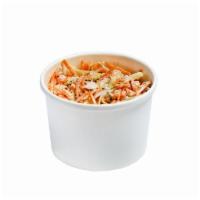 Southern Slaw · 8oz of shredded white and red cabbage, carrots, tossed in our house-made herb mayo sauce
