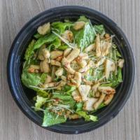 Chicken Caesar Salad · Grilled chicken and asiago cheese. Includes romaine lettuce, croutons, and a dressing of you...