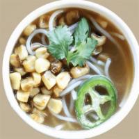Side Soup (No Meat) · 6-ounce cup of our house made pork and chicken broth with rice noodles, cilantro, charred co...