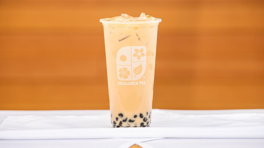 Honey Black Milk Tea · Loose-leaf black tea, honey syrup (made in house), and milk (makes approx twenty-four ounces). Our delivery version: packaged so your bubble tea arrives tasting as if you just ordered at the store.
