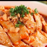 重庆口水鸡 / Mouthwatering Chicken · Poached chicken leg quarter, bone-in,  topped with roasted peanuts, scallions, sesame seeds,...