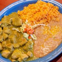 Chile Verde · Chunks of pork cooked tenderly in its own juice with a light tomatillo sauce and seasoned wi...