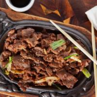 Beef Bul Go Ki · Barbecued sliced beef marinated in a special sauce
