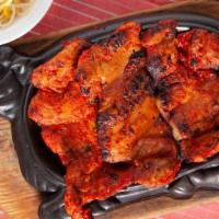 Dak Gu-I · Barbecued chicken marinated in a special Spicy sauce