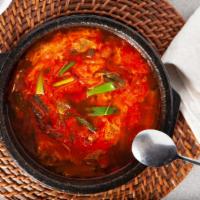 Yuk Gae Jang · Shredded beef, green onion and egg in spicy soup.