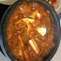 Soon Doobu · Soft tofu spicy soup in a pot.