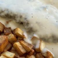 Country* · Diced potatoes ~ bell peppers ~ onions ~ diced chicken fried steak smothered in country grav...