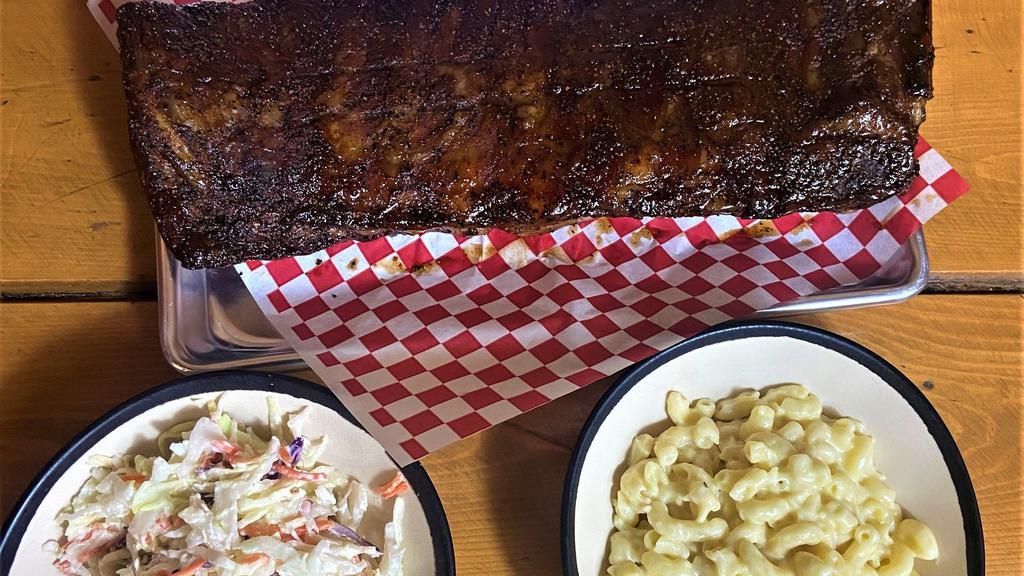 Full Rack Of Ribs · Comes with a full rack of tender pork spare ribs and two side items of your choice.