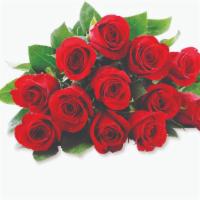 Debi Lilly Rose Bunch · Dozen freshly cut red roses.