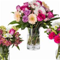 Designer'S Choice Arrangement · Seasonal Mix of Cut Flowers in Vase, colors may vary.