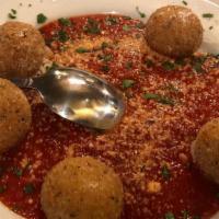 Fried Mozzarella Balls · Served with marinara sauce.
