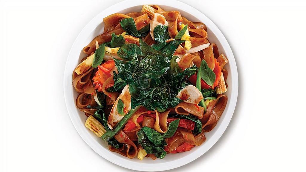 Drunken Noodles · Large rice noodles, egg, Chinese broccoli, bell pepper, onion, carrot, baby corn, Thai basil with sweet and sour sauce topped with crispy Thai basil