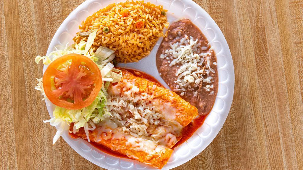 Enchiladas Combo · Three chicken or cheese enchiladas with side rice and beans lettuce tomato and sour cream.