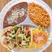 Torta & Taco Combo · Mexican sandwich with choice of meat lettuce tomato onions guacamole and sour cream with a s...