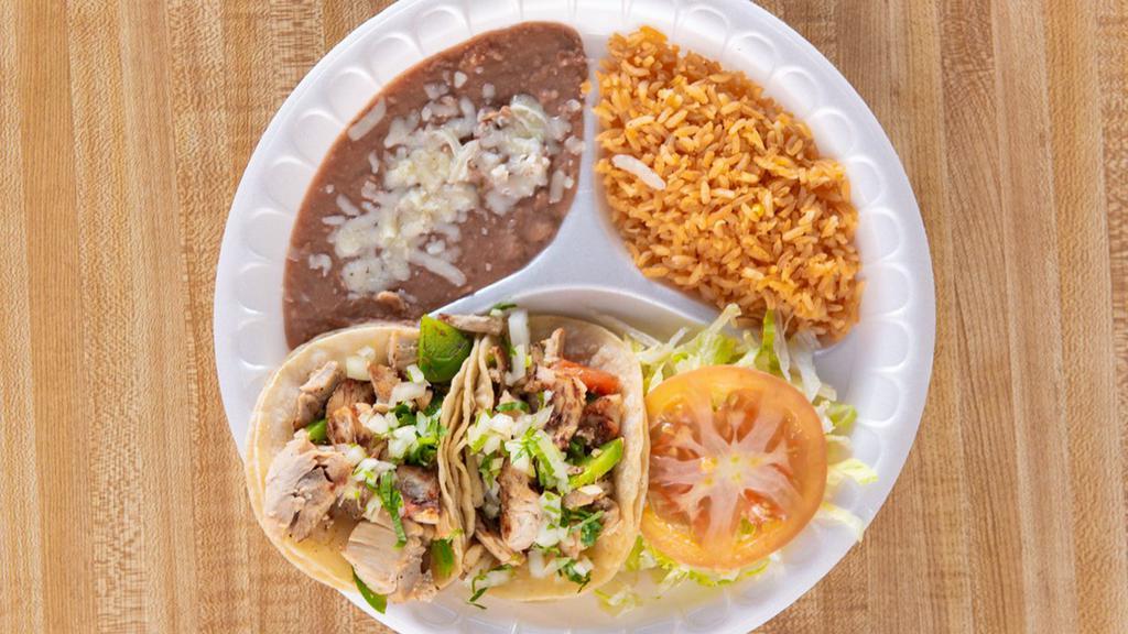 Torta & Taco Combo · Mexican sandwich with choice of meat lettuce tomato onions guacamole and sour cream with a side taco and rice and beans.