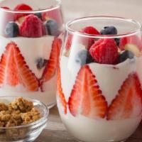 Vanilla Greek Parfait · Creamy vanilla Greek yogurt with fresh strawberries,raspberries and blueberries. Topped with...