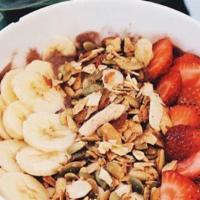 Acai Bowl · Acai, strawberry, banana, almond milk, topped with fresh fruit and house paleo granola.