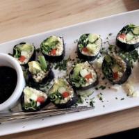 Seaweed Roll · Vegan. Raw. Sushi-style nori rolled with your choice of forbidden rice or macadamia nut rice...