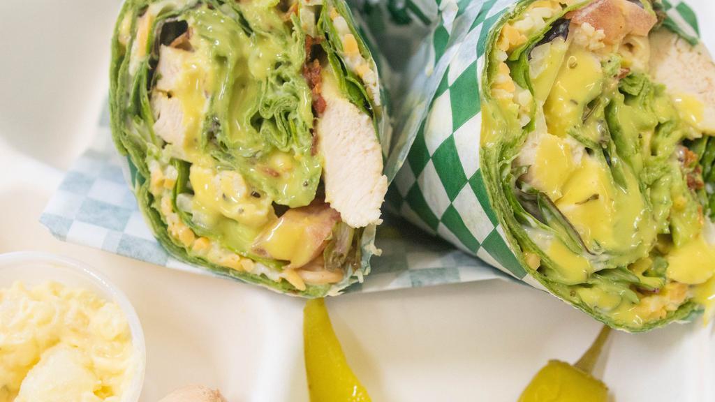 #4Ac. Chicken Bacon Avocado Wrap (Spinach Or White Tortilla) · Favorite. Baked Chicken, Shredded cheese, Spring mix, Avocado, Diced tomato & White Onion, Mayonnaise, Mustard, and House Sauce.