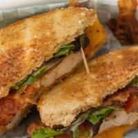 #1B. Ta Signature Chicken Bacon Sandwich On White Bread · Our Classic BLT layered with sliced Baked Chicken Breast.
