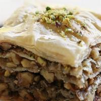 Baklava · A dessert originating in the Middle East made of phyllo pastry filled with chopped nuts and ...