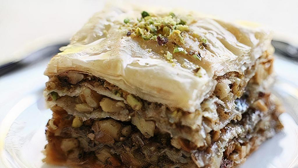 Baklava · A dessert originating in the Middle East made of phyllo pastry filled with chopped nuts and soaked in honey.
