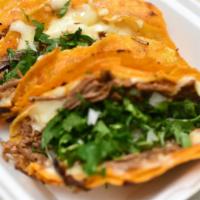 Queso-Birria Taco  · Cheese Taco topped with cilantro, onion