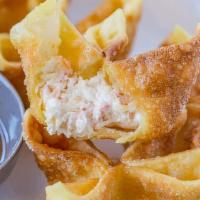 Crab Rangoon · Six pieces. Cream cheese, crab meat, green onion, deep-fried in wrapper and served with swee...