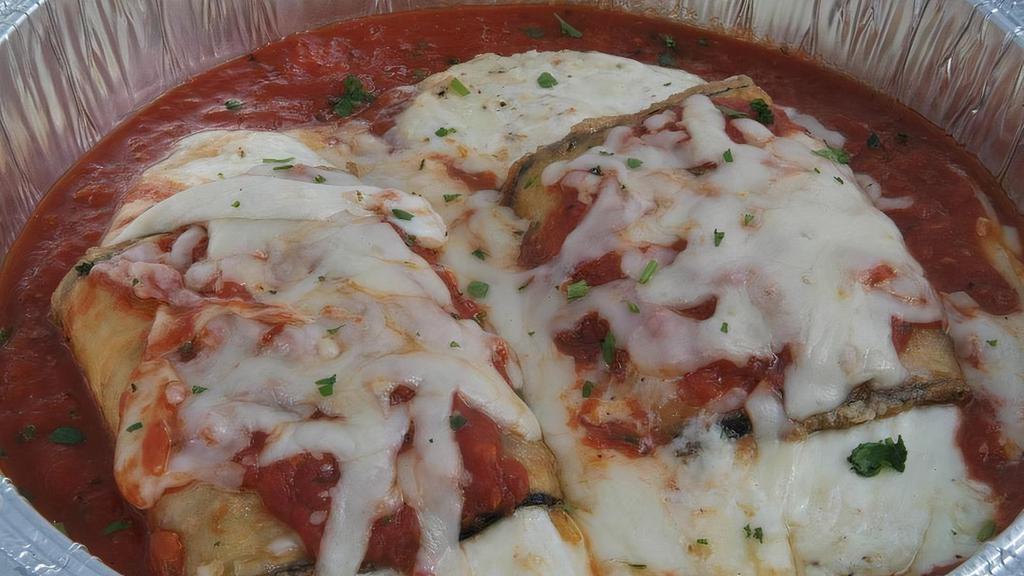 #2 Eggplant Involtini · Italian Cheese Blend, rolled in thinly sliced Eggplant and baked in Pomodoro Sauce