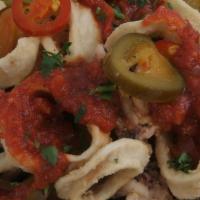 #6 Fried Calamari · Town Dock Rhode Island Squid served with hot cherry peppers and Fra Diavolo sauce