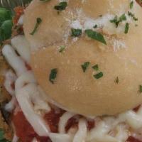 #8 Garlic Knot Eggplant Slider · Freshly breaded Eggplant covered in Pomodoro Sauce and Mozzarella served between a sliced Ga...