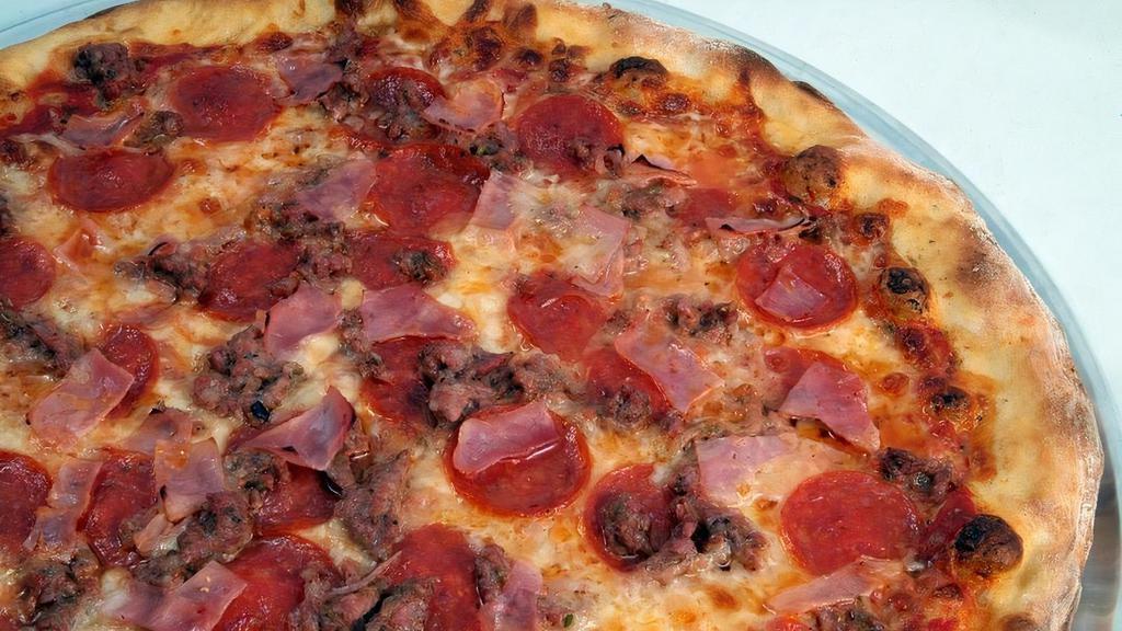 #20 Small Mega Meat · Pepperoni, Sausage, Ham, Mozzarella Blend, and House Red Sauce.