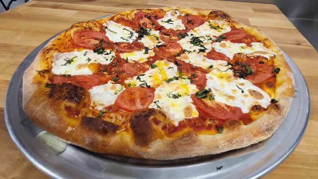 #14 Small Margherita · House-Made Fresh Mozzarella, House Red Sauce, Fresh Basil, and EVOO