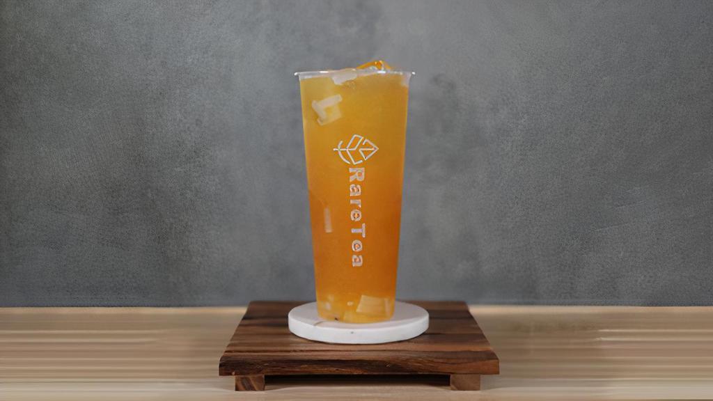 Mango Passion Fruit Green Tea · Sweet, refreshing, and slightly tart our mango passion fruit green tea is made with our in-house mango puree and passion fruit jam shaken with our freshly brewed Jasmine Green Tea.