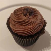 Choco Holic · Chocolate cake with chocolate buttercream topped with chocolate shavings.