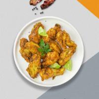 Lemon Pepper Wings · Eight lemon pepper wings (mild heat), served with carrots & celery and a choice of blue chee...