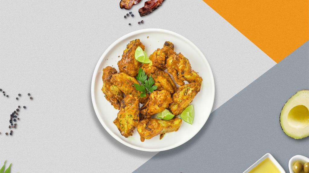 Lemon Pepper Wings · Eight lemon pepper wings (mild heat), served with carrots & celery and a choice of blue cheese, classic ranch, or Sriracha ranch for dipping.