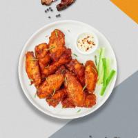 Cajun Wings · Eight Cajun dry rub wings (mild heat), served with carrots & celery and a choice of blue che...