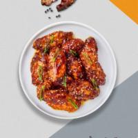 Teriyaki Wings · Eight teriyaki smoked and grilled wings (mild heat), served with carrots & celery and a choi...