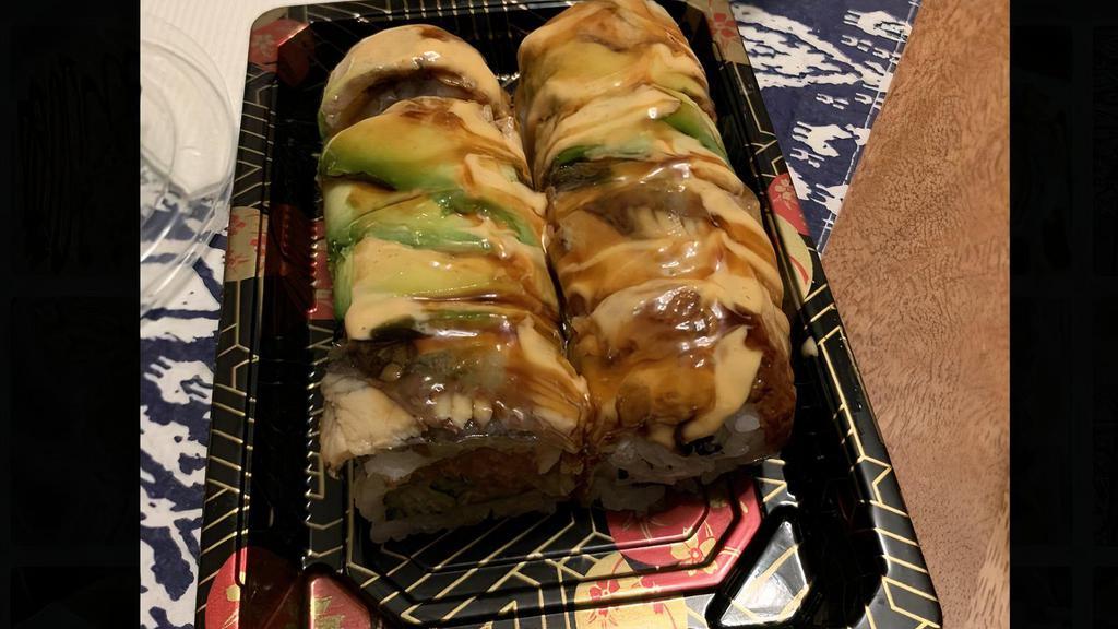Dragon Gone Wild · In: spicy tuna, cucumber top: eel, avocado sauce: sweet sauce and spicy mayo etc.: contain raw fish. Little spicier than 'dragon' roll.