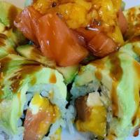 Sweet Dreams Roll · In: salmon, cream cheese, mango top: avocado middle: cucumber, salmon, mango sauce: yuzu, sw...