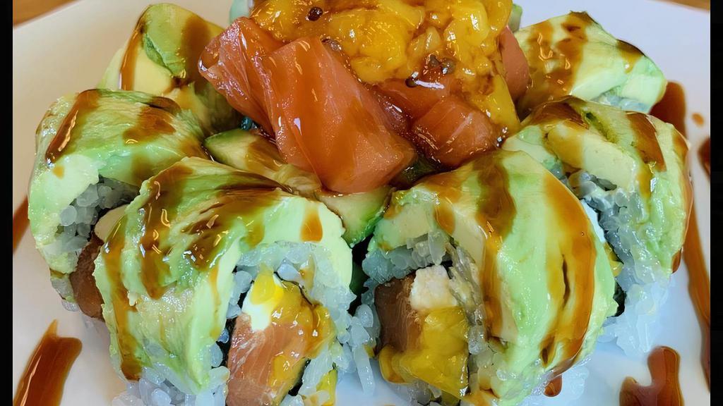 Sweet Dreams Roll · In: salmon, cream cheese, mango top: avocado middle: cucumber, salmon, mango sauce: yuzu, sweet sauce, Kai sauce.