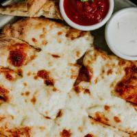 Cheesy B · Cheese bread with ranch and red sauce. Sub vegan moxxarella to make vegan, we will also subs...
