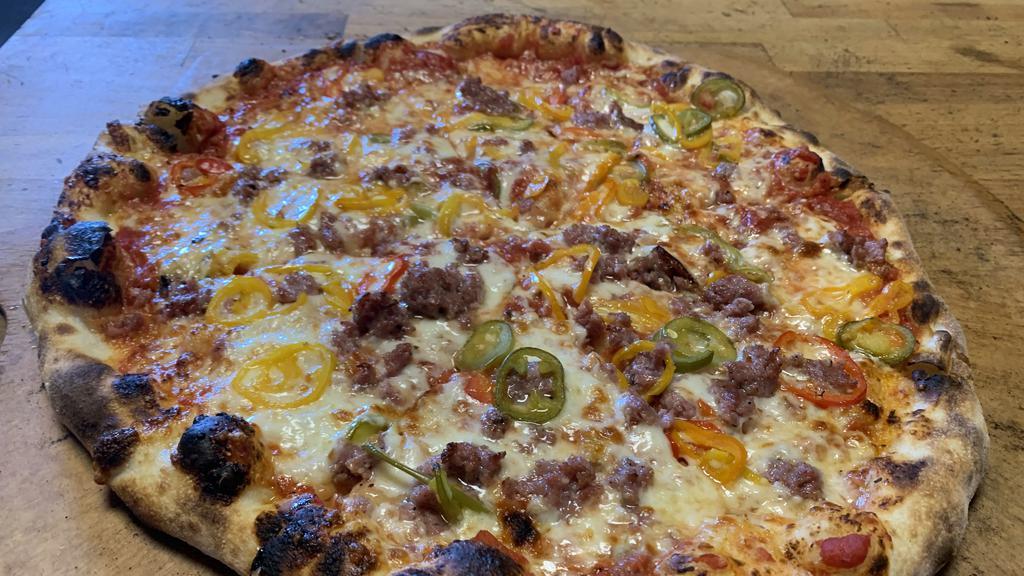 Princess Sarah · Princess Sarah’s sausage, house pickled peppers.

As of March 31, 2022, we no longer offer 1/2 and 1/2 pizzas.