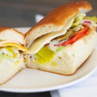Veggie · Cheddar, Swiss & provolone cheese, lettuce, tomato, pickles, pepperoncini, Italian dressing ...
